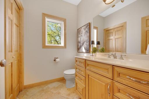 Main floor 1/2 bath also situated off of the garage and mudroom.