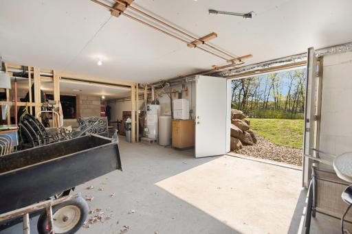 And if the garden shed wasn't enough for storage, don't miss the basement access through the exterior double doors under the home- FULL of storage and possibilities.