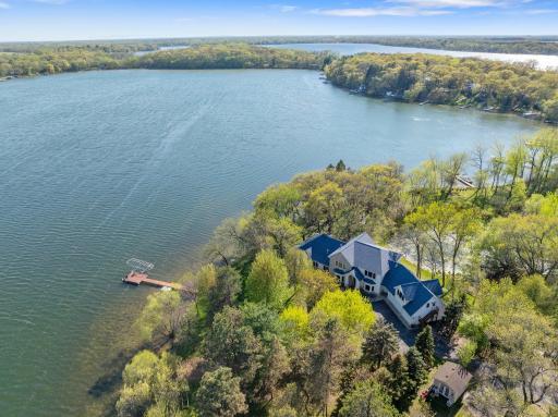 Welcome HOME to your very own, private peninsula on Lake Julia and the Briggs Chain of Lakes. This exceptional property is ready for your family to bring the boat, and make memories!