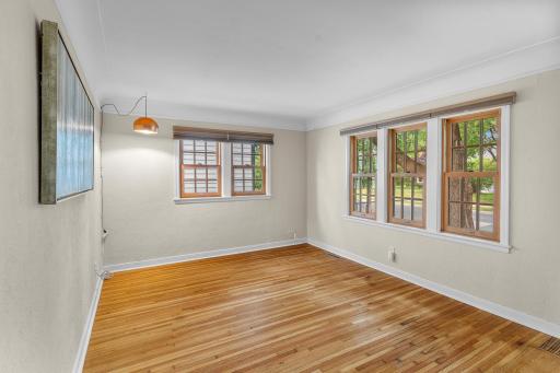 Original hardwood floors main level (except Kitchen). South and west facing windows allow for natural light throughout the daylight hours.