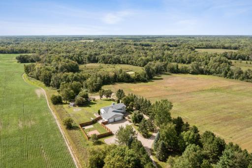 Incredible 5-acre property in quiet country setting, yet offering tons of amenities!