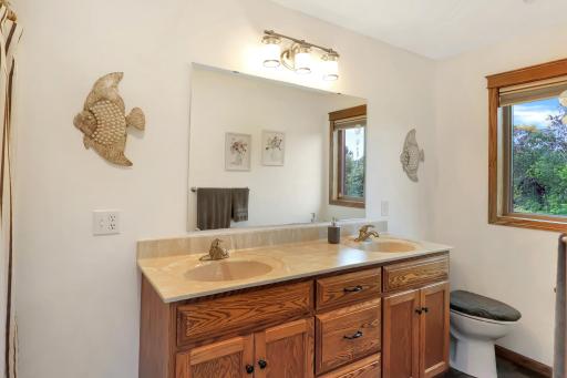 Full primary bathroom with raised height vanity..jpg