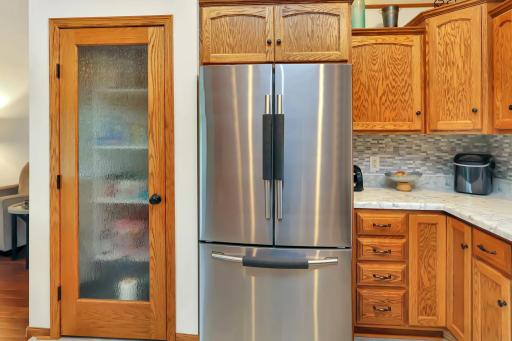New stainless steel fridge, large pantry, and tons of cabinet space..jpg