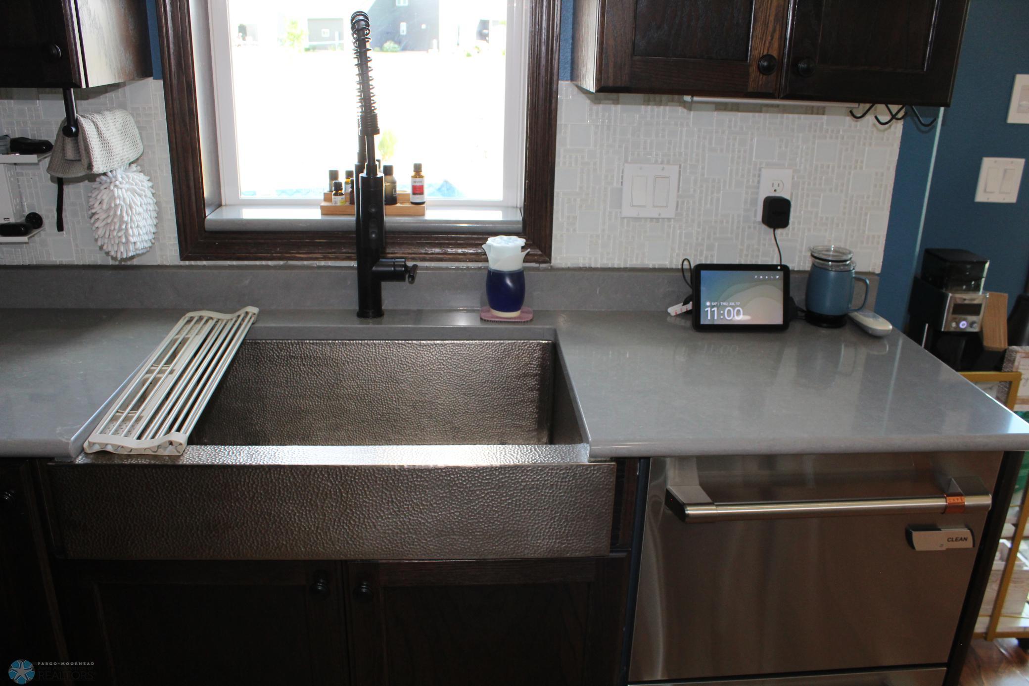 Kitchen-newer high-end sink, faucet and dishwasher, great pool view