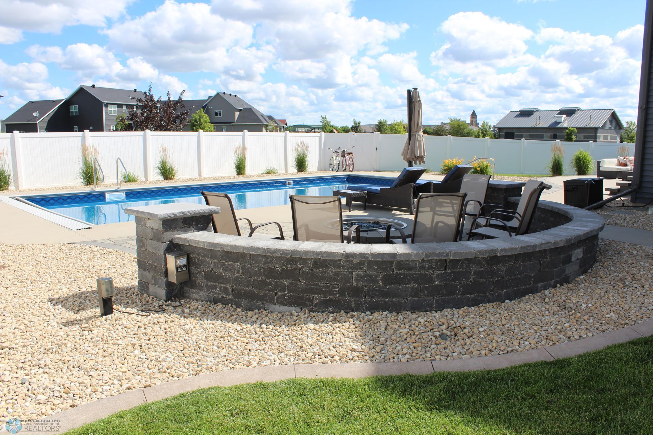 Fire pit piped in for gas, back gate to bike path