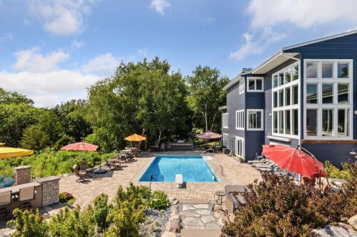Welcome to 10460 Bluff Circle! This home is sited 9+ acres overlooking the Minnesota River Valley and offers commanding views and resort style living that's hard to beat!