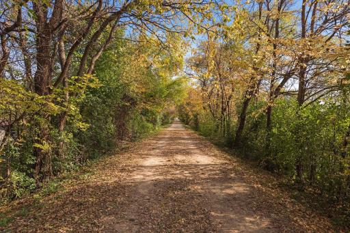 The property borders the Minnesota River Bluffs LRT trail - this 9+ mile trail stretches from Eden Prairie to Chaska and offers breathtaking views along the way.