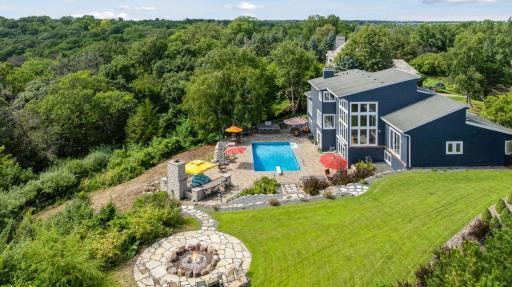 This home is sited 9+ acres overlooking the Minnesota River Valley and offers commanding views and resort style living that's hard to beat!