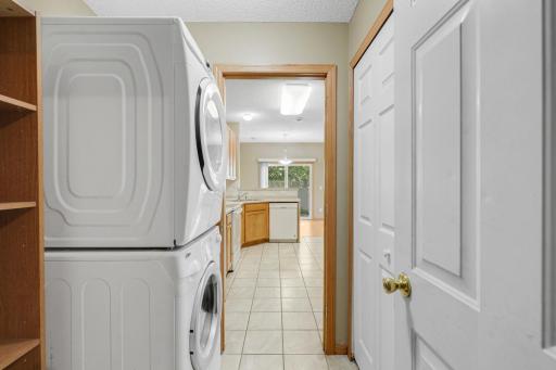 View from garage, laundry area with closet