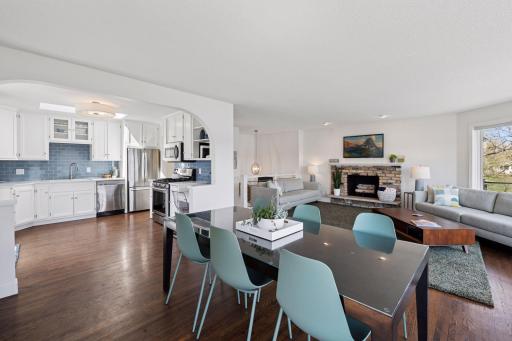Enjoy seamless hosting in this inviting informal dining room, perfectly connected to the kitchen for effortless meal service and gatherings.
