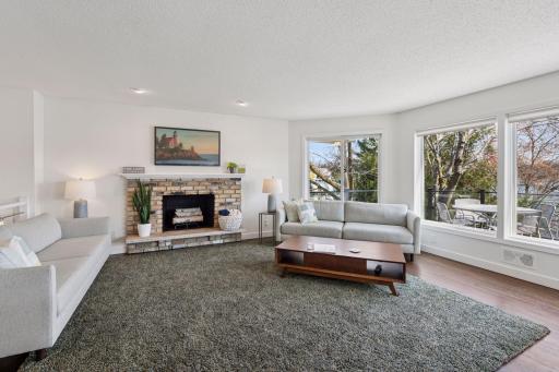 Step into this living room with incredible views of Lake Minnetonka