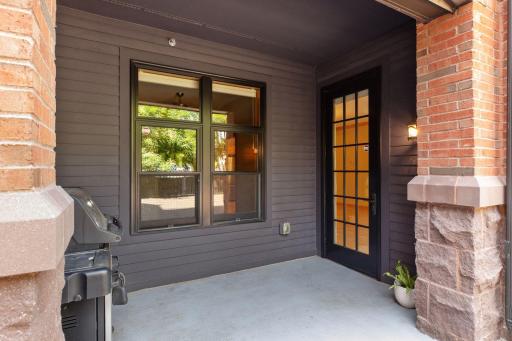 Unit 103 patio with gas grill