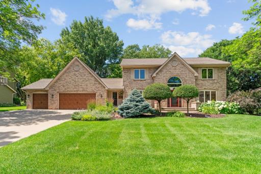 Welcome home to 3675 Woodland Trail - This meticulously maintained home sits in the prestigious Woodlands neighborhood.