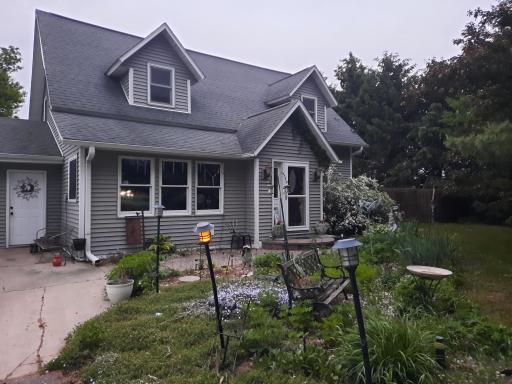 Beautiful private country home - close to Ellsworth, WI., and Red Wing, MN. Original hardwood floors, 3 bedrooms, 2 baths, undated kitchen with new granite counters on 7-30-25 and new flooring on main floor. One-car attached garage and a carport.