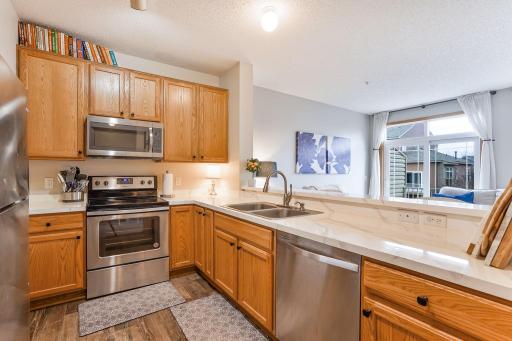 Spacious kitchen with stainless steel appliances, walk-in pantry and plenty of counter space