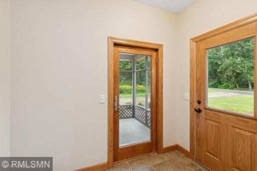 Side entryway and access to side/front screened in porch