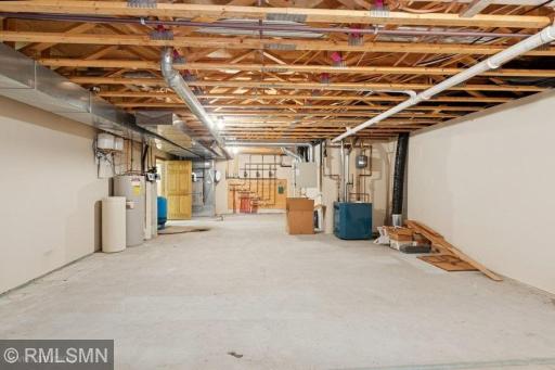 Utility room. Lower level has in floor heat with three different zones