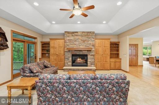 Family room area with beautiful gas fireplace and built ins for more storage!