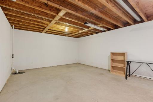 Incredible opportunity to build equity! Partially finished lower level addition, located under the kitchen dining/sun room. Ready to use as-is, or finish, and instantly build equity by increasing the overall size of the home.