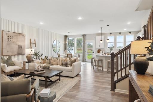 The Duncan offers a wide-open main level floorplan that allows you flexibility and comfort in any layout you choose for your new home. Photo of model home.