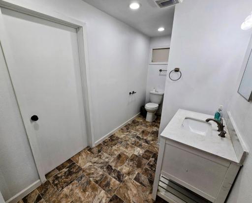 Spacious bath with door that opens into bedroom #2