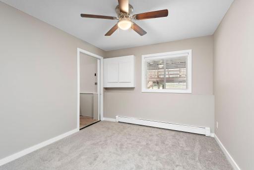 4th bedroom Level Bedroom with ceiling fan, new carpet and freshly painted
