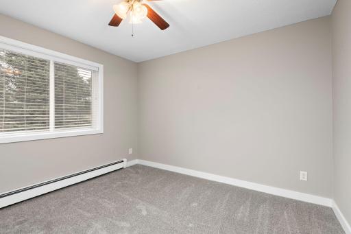 Upper Level Bedroom with ceiling fan, new carpet and freshly painted