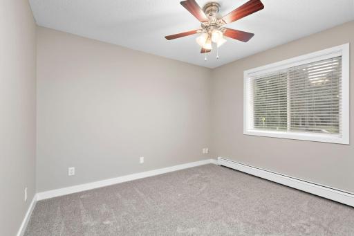 2nd Upper Level Bedroom with ceiling fan, new carpet and freshly painted