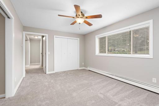 3rd bedroom Level Bedroom with ceiling fan, new carpet and freshly painted
