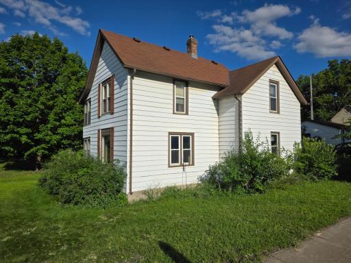 Classic two-story home on a corner lot in a charming neighborhood.