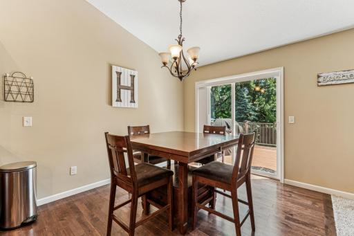 The informal dining space leads to the relaxing deck!