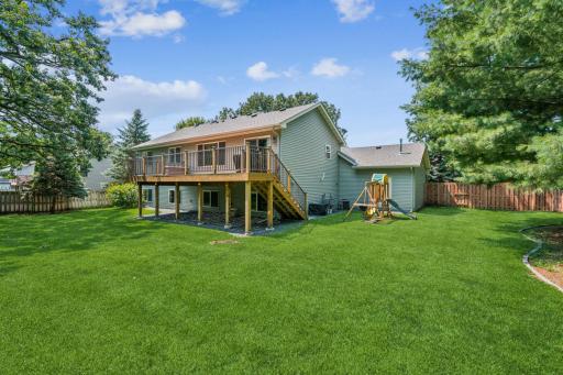 Fully fenced backyard, deck, shed, and a playset!