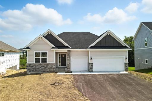 Just finished! Fabulous show stopping floorplan, backs up to trees & pond! Sod, landscaping included. Community pool, clubhouse, miles of walking trails, parks, & Mississippi River down the street! This is a rare gem! Fall in love & call it HOME!!10+