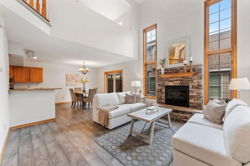 Main level open-concept living room/dining room (with gas fireplace) /kitchen