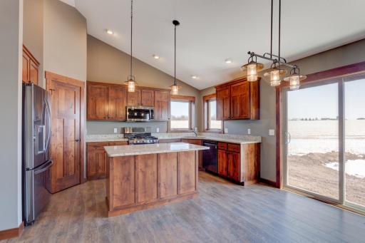 Photos are of a previously completed home with similar design and features. Actual selections, finishes, and materials may vary based on buyer choices and availability.