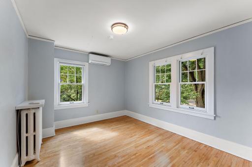SW Bedroom upstairs. There's a ductless mini-split unit in each of the three living areas upstairs!