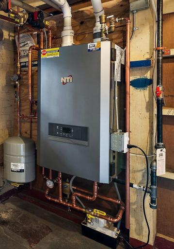 Check out that modern high-efficient boiler (2023).