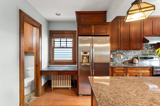 As a special bonus, note the cozy half bath to the left, the ever-so-rare main floor bath lacking in so many homes of this era.