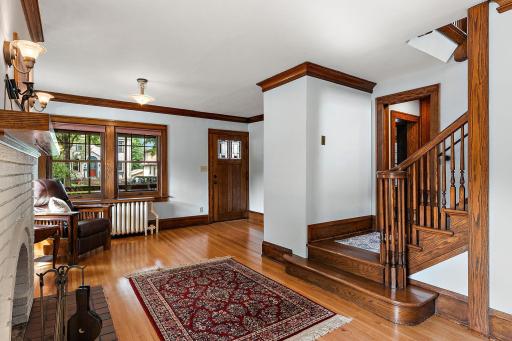 Living room. The original woodwork is gorgeous.