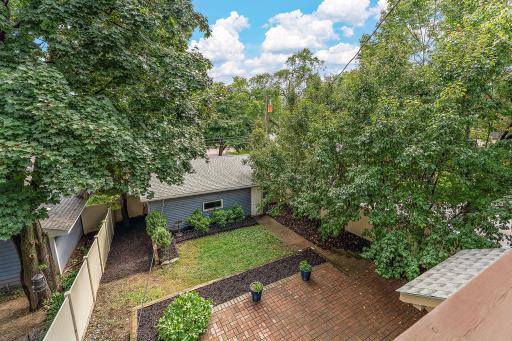 Lovely view from second floor deck. You’ll feel like you’re up among the trees!