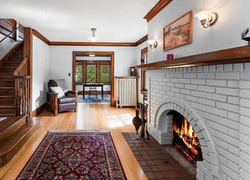Living room with wind burning fireplace (fire virtually added).