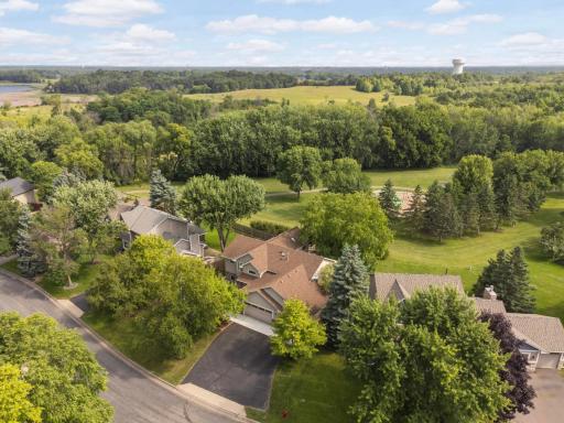 Start your next chapter in this immaculately maintained Champlin home and enjoy life surrounded by the beauty of the Elm Creek Park Reserve.