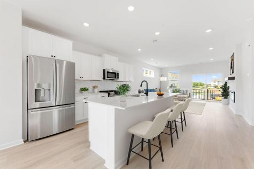 Light and bright! The kitchen has timeless finishes that blend an elevated feel and functionality.