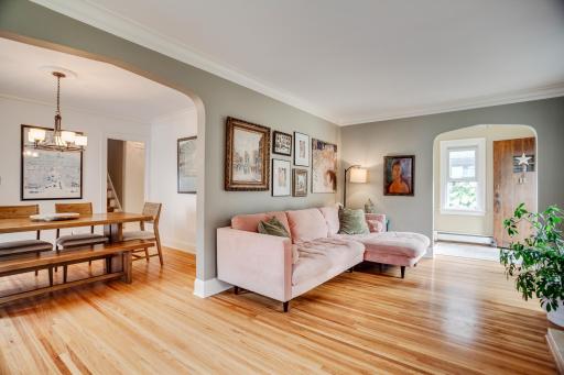 Living room opens into formal dining room