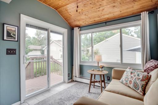 Cozy sunroom off of the kitchen and onto the deck and patio