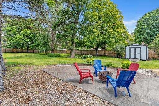 Half acre lot is fully fenced with cedar privacy fence.
