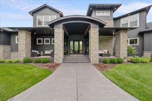 The Grand Entrance is a good indicator of an equally grand interior. The lighted barrel arch is an attractive first-impression feature. The sconces on either side of the front door are gas burning