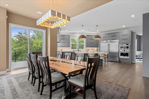 Lovely dining space with open convenience to Chef's kitchen. A mixture of Neutral color palette giving great design options.