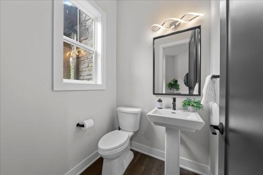 Off the back entrance you will find this convenient Powder Room