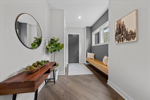 The back entrance off the garage has a large walk-in closet and all of this space to accommodate your needs